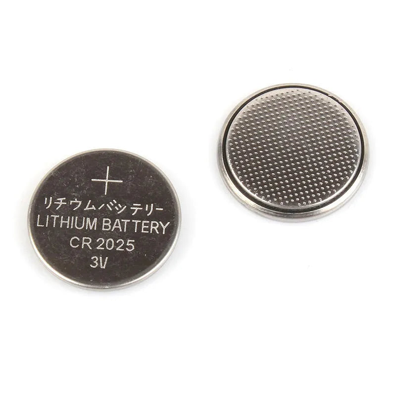 3V button battery CR2032 alkaline cell 20mm diameter on white background