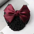 Professional hair clip with decorative flower bow and integrated work plate featuring net pocket storage