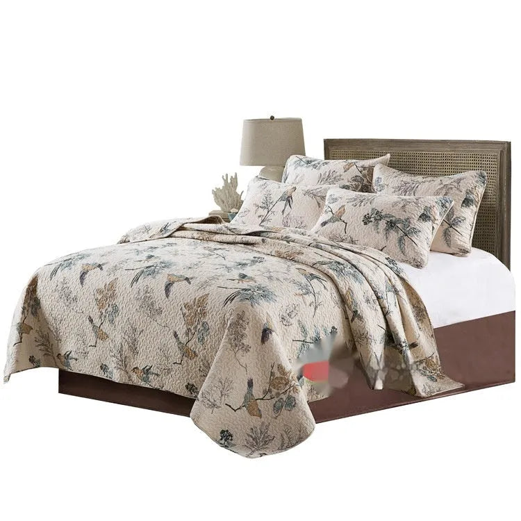 Pure cotton quilted bed cover with reactive printed pattern on bed