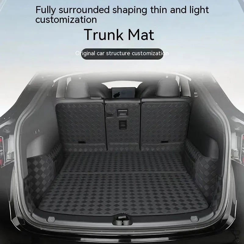 Leather trunk mat for Tesla Model 3 in black with buckle fitting lying in boot