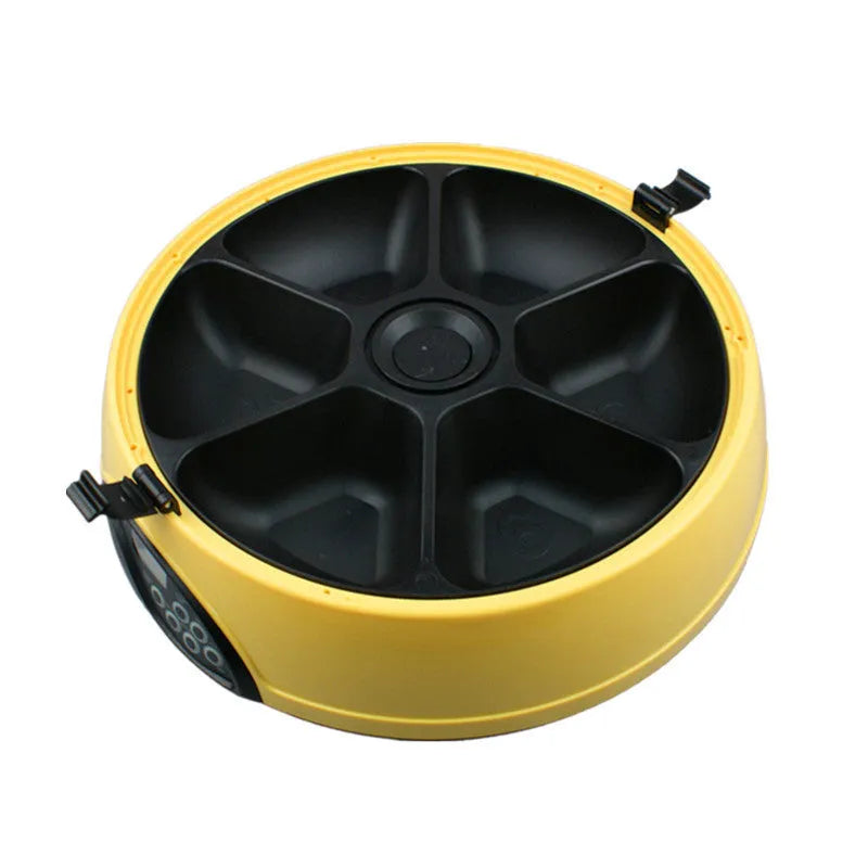 Pet automatic feeding machine in yellow with six food storage slots and display