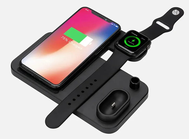 Black 4-in-1 wireless charging station for iPhone, Apple Watch, AirPods and Apple Pencil on a desk