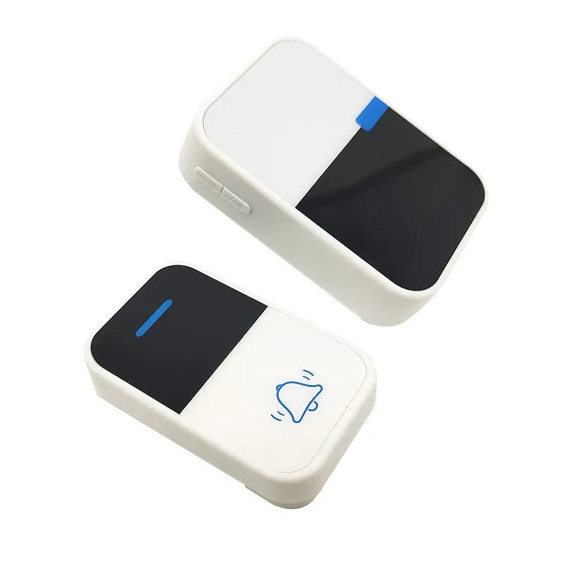 White plastic wireless doorbell with receiver unit and complementary component on modern home exterior