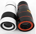 12X telephoto phone camera lens with clip attached to smartphone showing long distance zoom capability