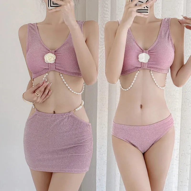 Three-piece bikini swimsuit in pink or black colours with briefs styling and sleeveless design for swimming