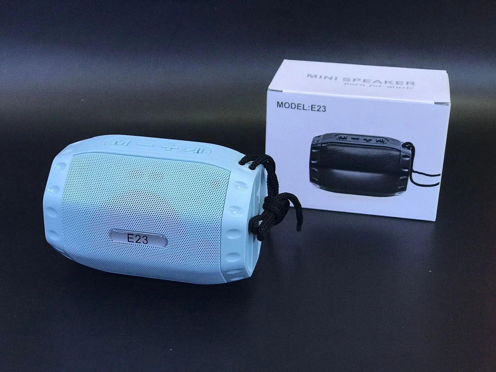 Black wireless USB card small Bluetooth speaker with fabric grille and USB port