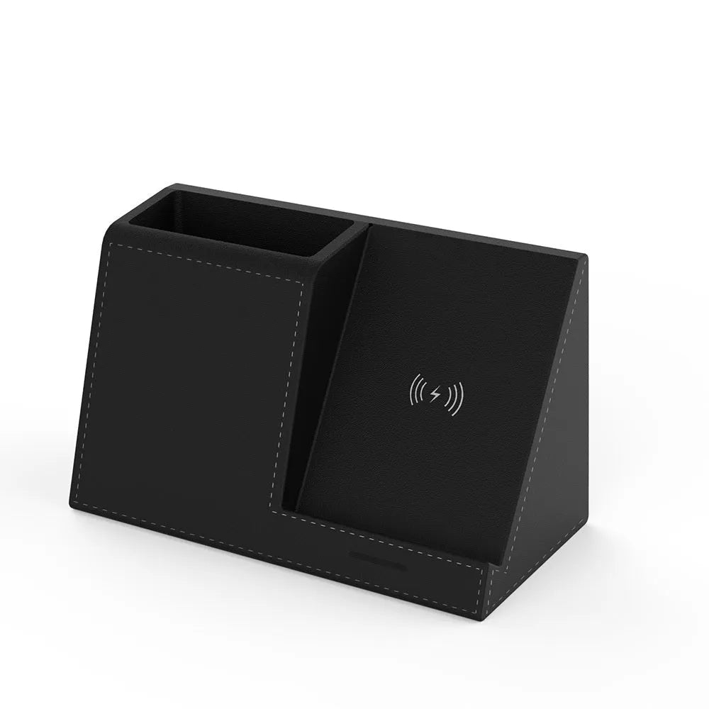 Leather pen holder wireless charger on desk with phone charging and pens organised