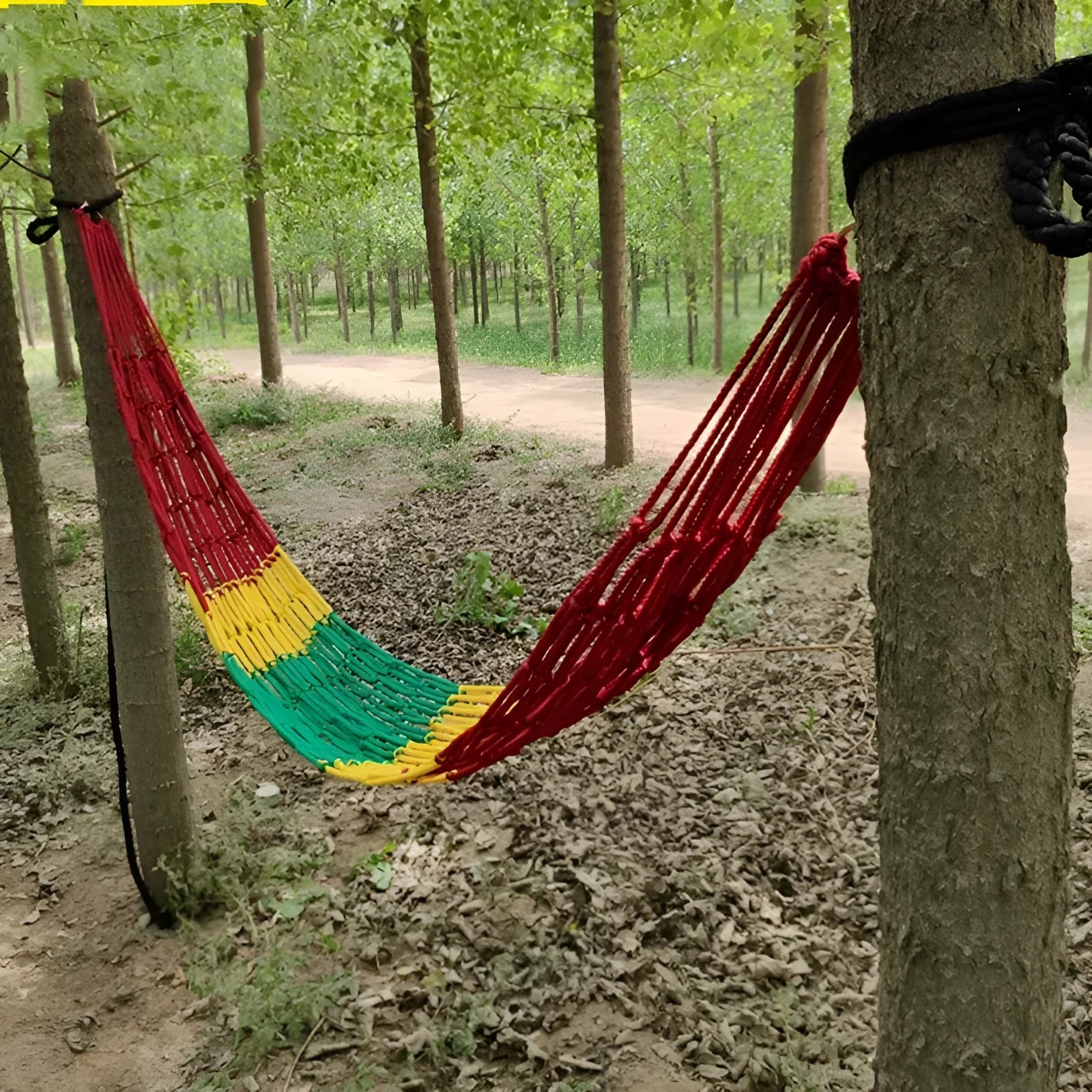 Nylon rope mesh hammock shown outdoors with dimensions 1.1m wide by 2.1m long