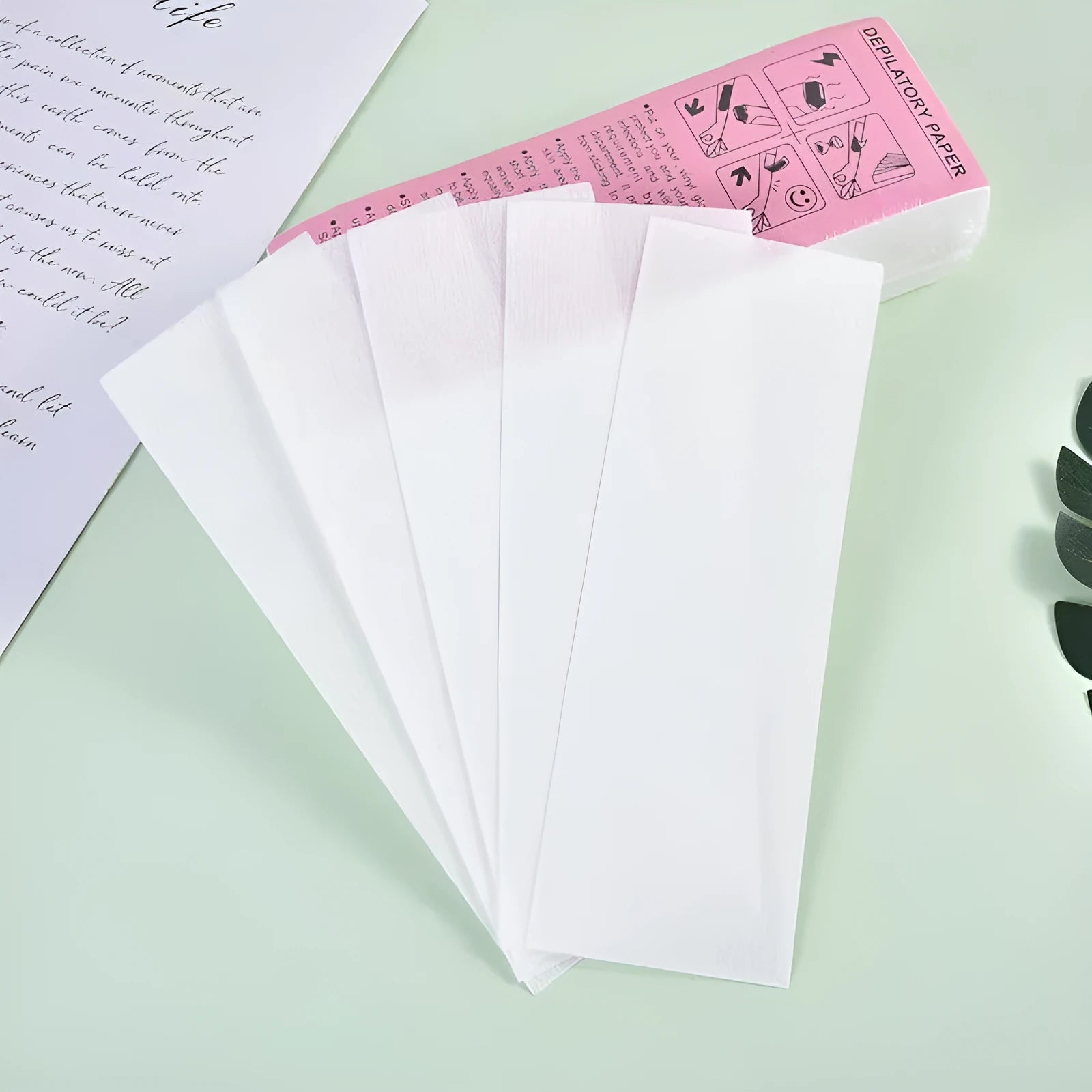 Non-woven hair removal wax strips in a pack for salon and home use