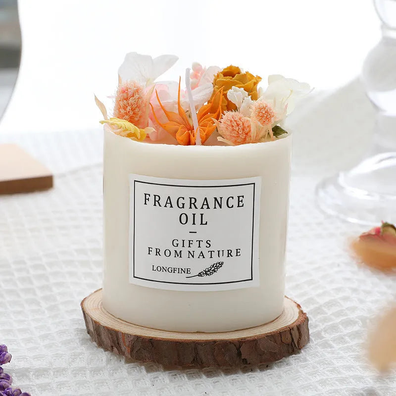 Aromatherapy candle with dried flowers on top, shown in various scent style options.