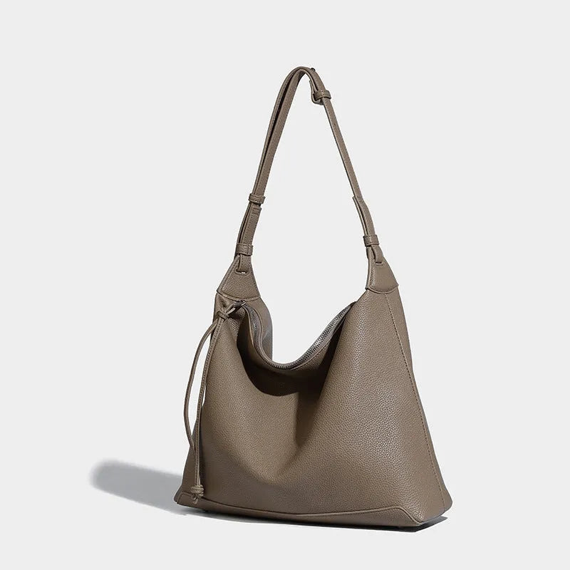 Large capacity underarm shoulder messenger bag in caramel PU leather, 36cm length, with soft texture