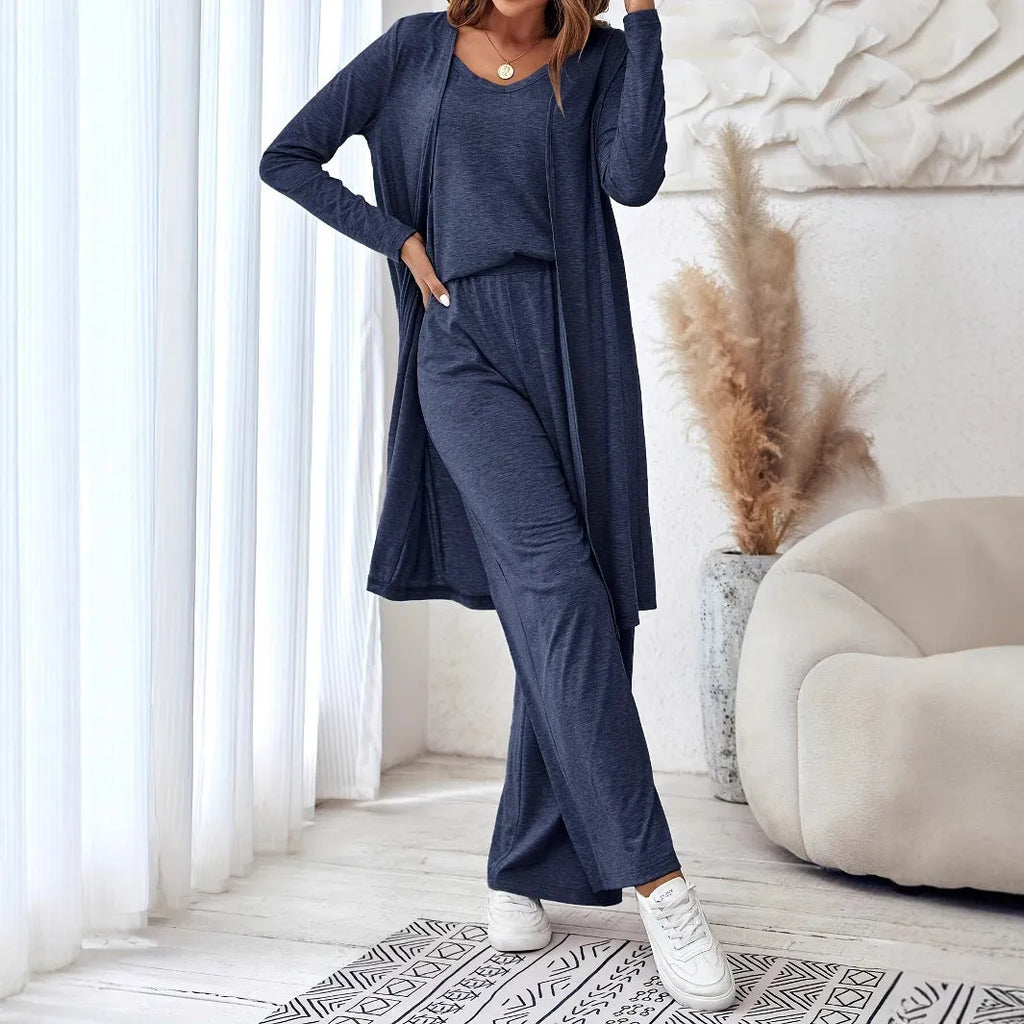 Women's blue polyester co-ord suit set with sling top, long cardigan, trousers and suspenders