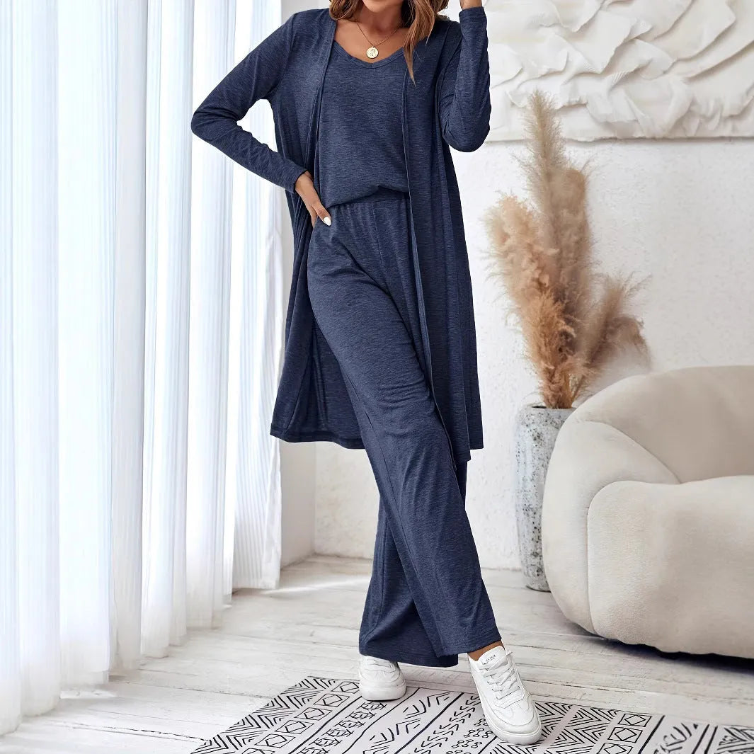Women's blue polyester co-ord suit set with sling top, long cardigan, trousers and suspenders