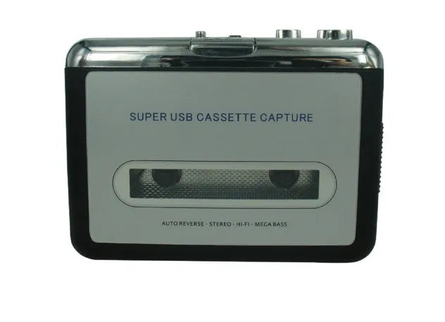 Cassette to MP3 converter device with USB cable on a desk next to a cassette tape
