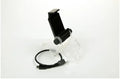 Black PS4 controller mount clip holding an Android phone with OTG cable connected, showing gaming setup