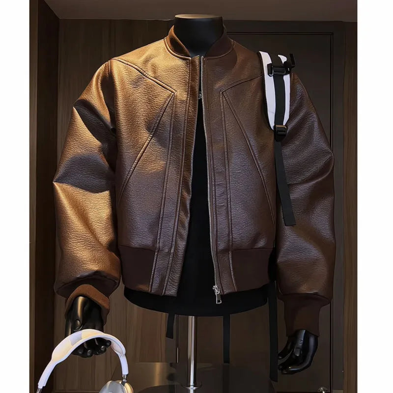 Man wearing a black slim-fit PU leather jacket with litchi pattern texture and extended 100cm length