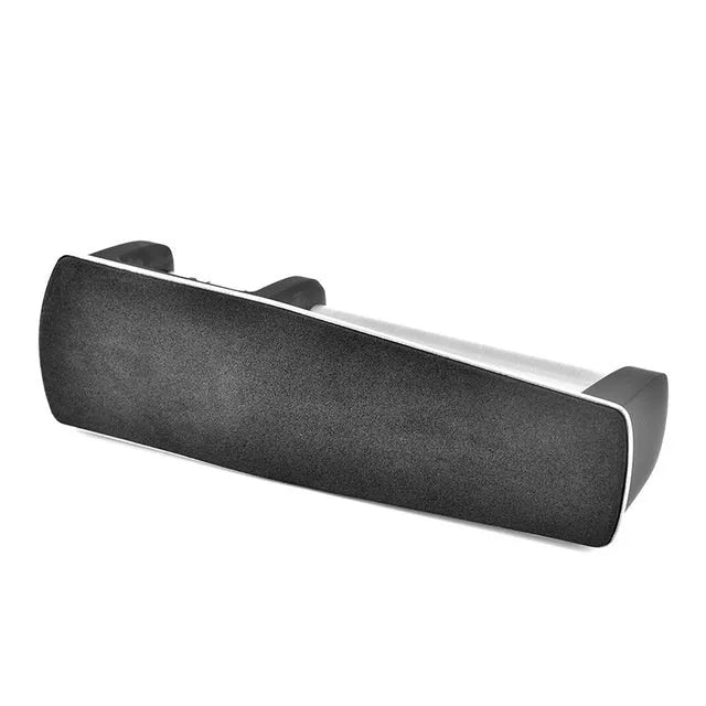 New kitchen sharpener made of black ABS plastic on a surface, manual knife sharpening tool