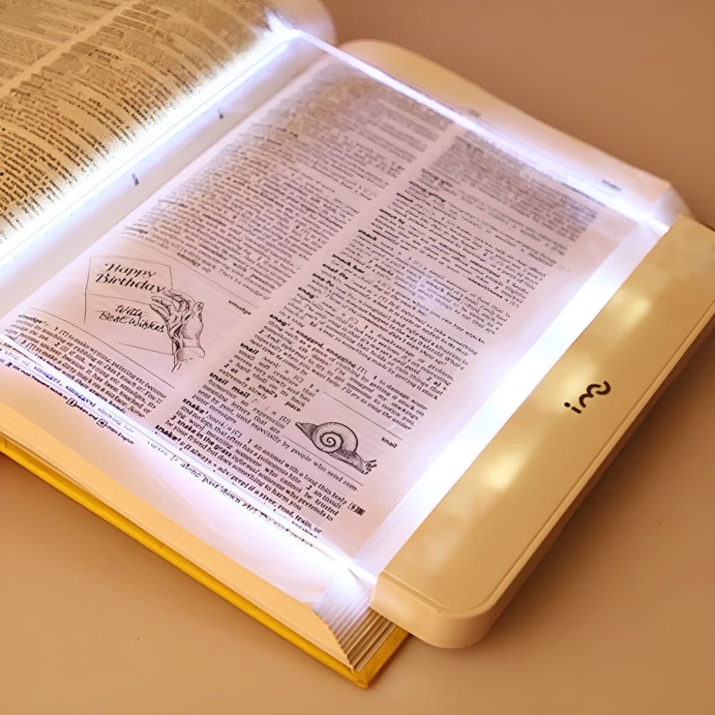 Dimmable LED panel book reading lamp with PMMA acrylic lens on a book page