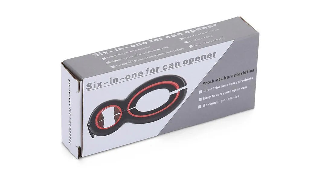 Six-in-one ergonomic bottle and can opener with stainless steel head and soft grey handle on a kitchen countertop