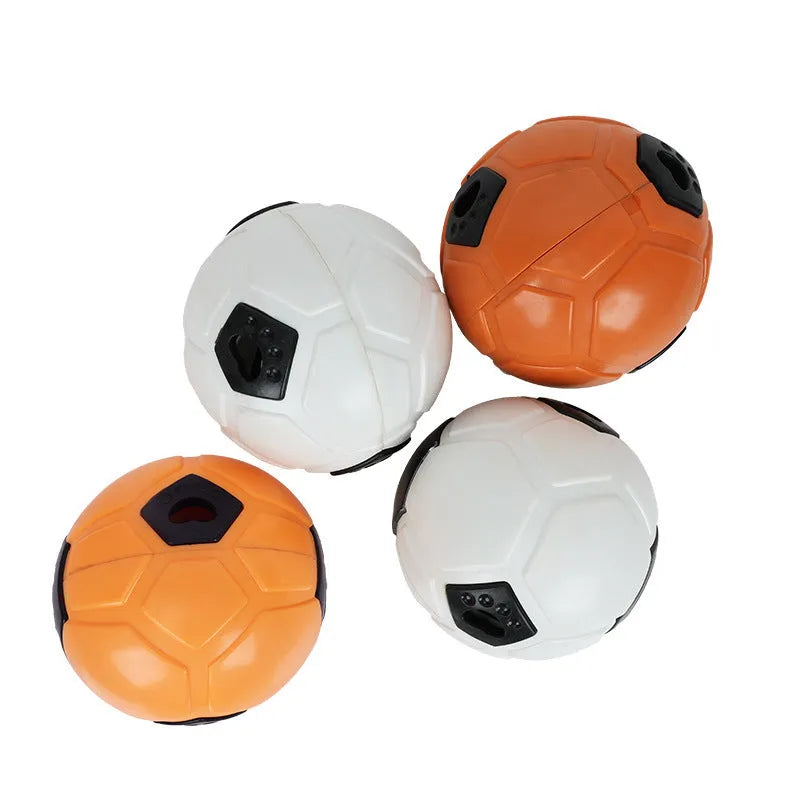 Orange hollow style TPR dog toy ball for nibbling and teeth grinding on a neutral background
