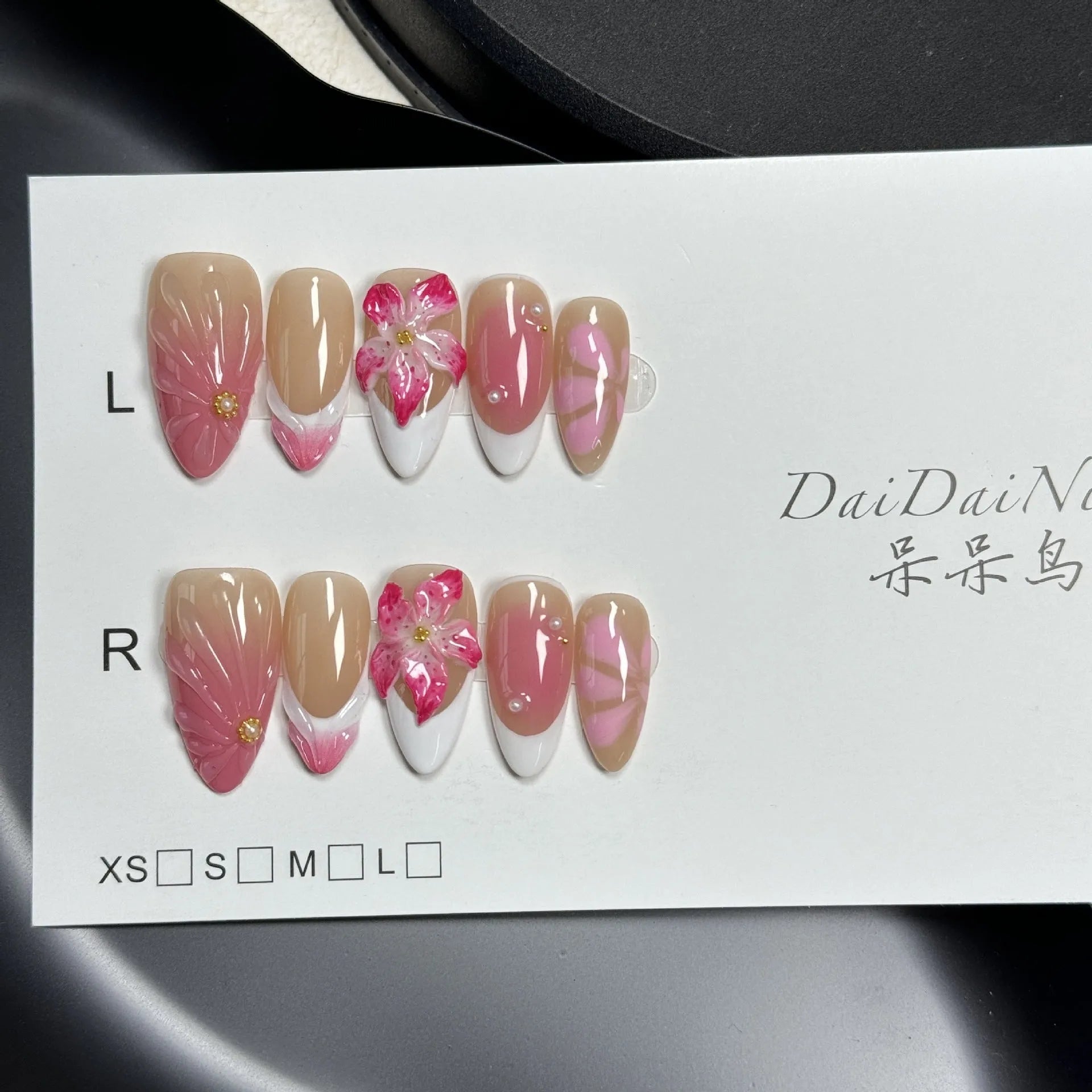 French style artificial nails with 3D lily and ice flower design on almond-shaped plastic tips.