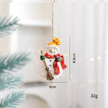 Small resin Christmas tree pendant ornament with a snowman figure holding a broom