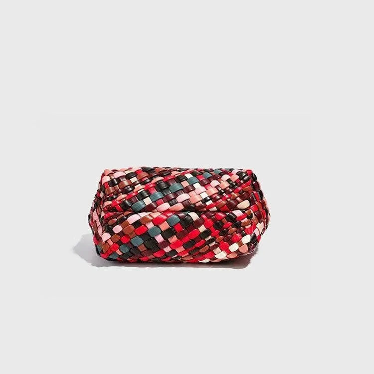 Women's casual handmade woven PU shoulder bag in colour, 18x11x14cm, on display