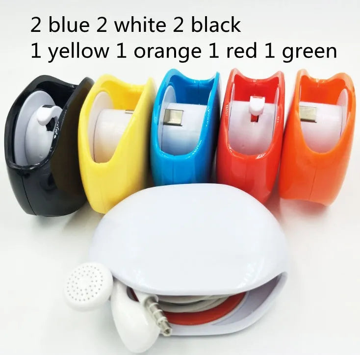 Automatic earphone cable winder retractor in multiple colours showing compact size