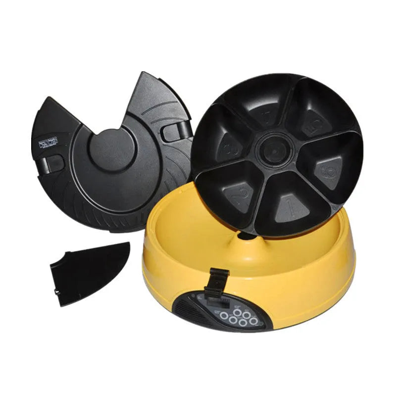 Pet automatic feeding machine in yellow with six food storage slots and display