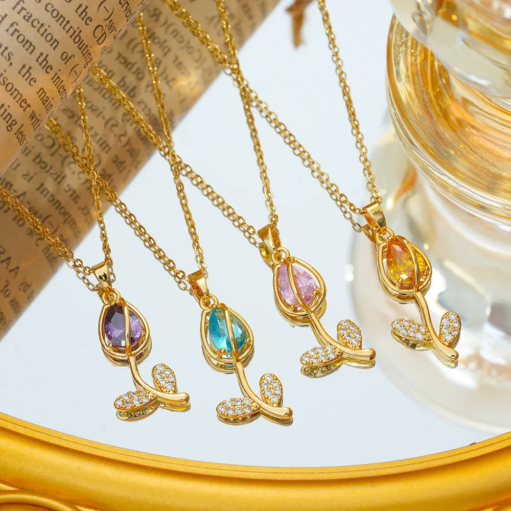 Gold-toned zircon tulip pendant necklace on titanium steel O-ring chain with adjustable 41-50cm length
