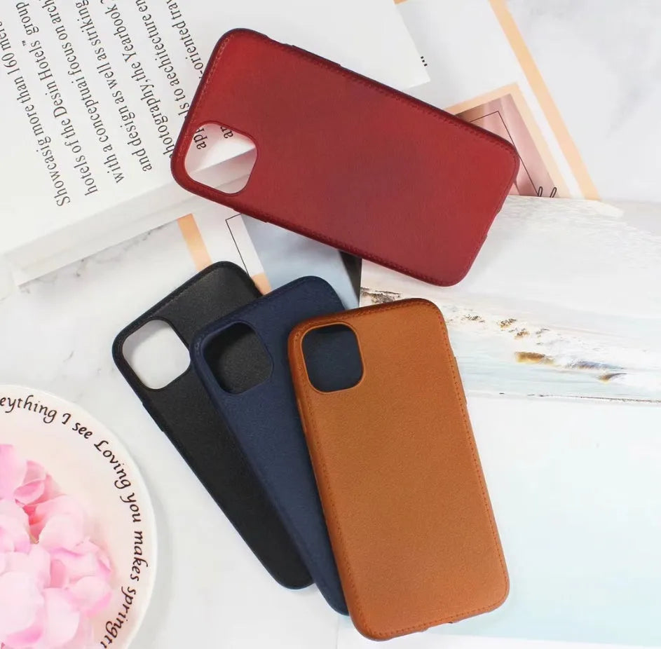 Black leather-style TPU phone case for iPhone 11 Pro Max with precise cutouts for camera and buttons