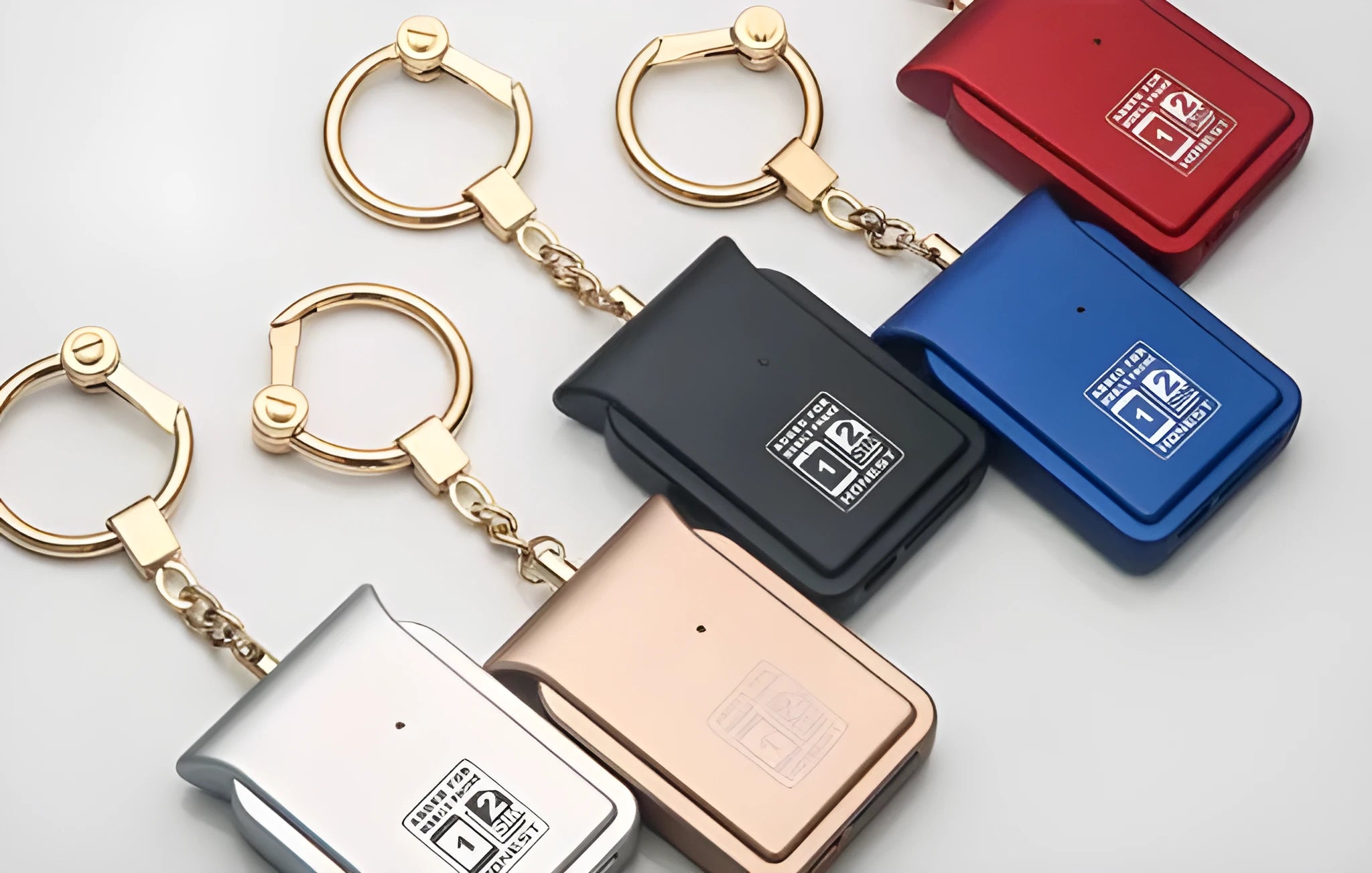 Bluetooth dual SIM adapter keychain with Nano SIM slot and leather finish, compatible with iOS devices