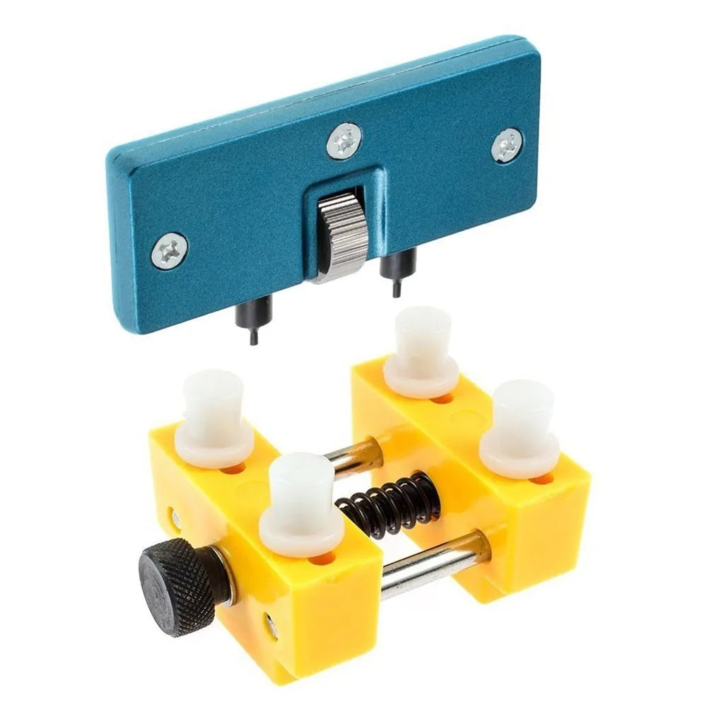 Yellow plastic watch repair case opener kit with mounting base and four fixing pillars on a workbench