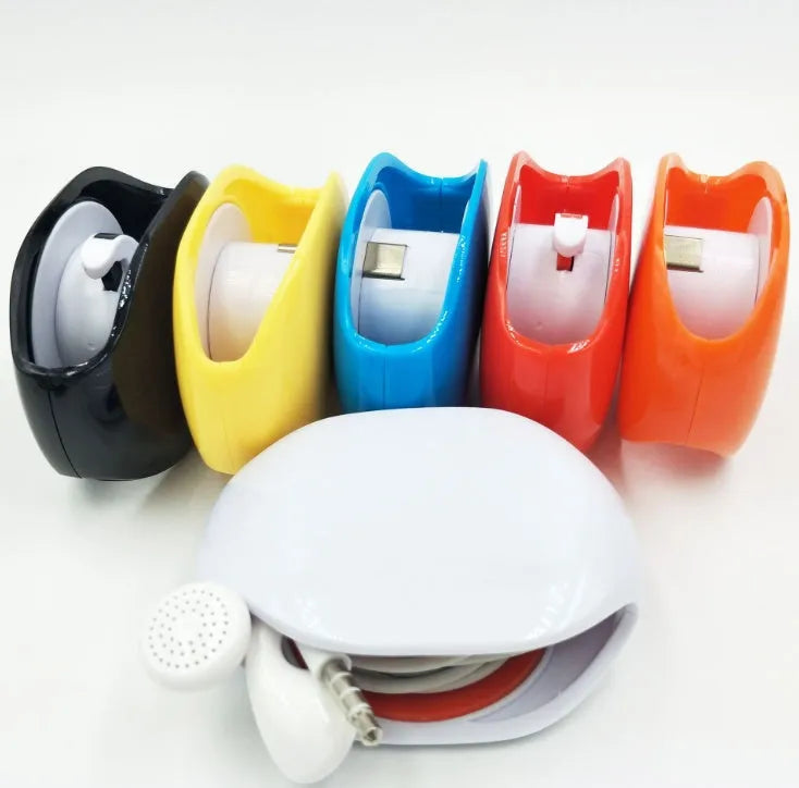Automatic earphone cable winder retractor in multiple colours showing compact size