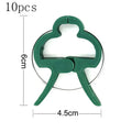 Green plastic plant fixing clips for climbing plants including tomatoes and beans