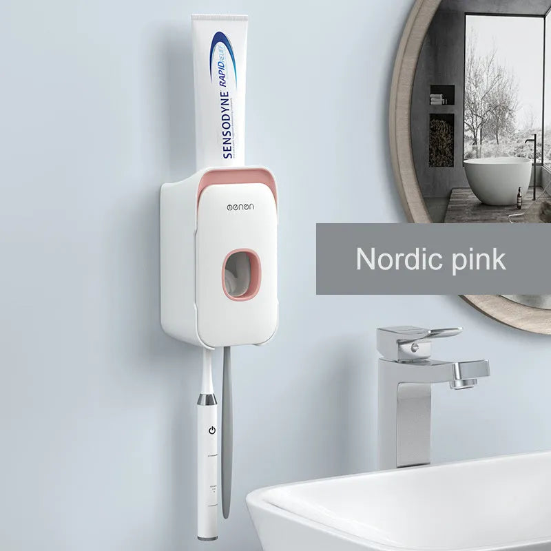 Automatic toothpaste dispenser in blue, grey, and pink colours made from ABS plastic.