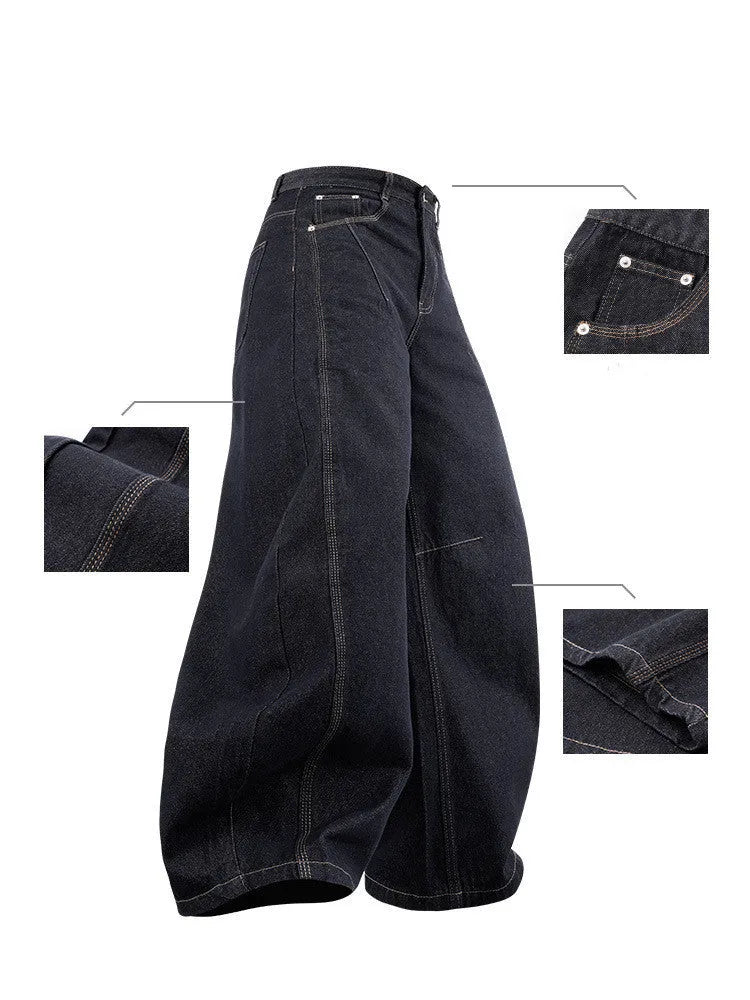 Men's original cow colour wide-leg denim trousers laid flat, showing mid-waist and full-length legs.