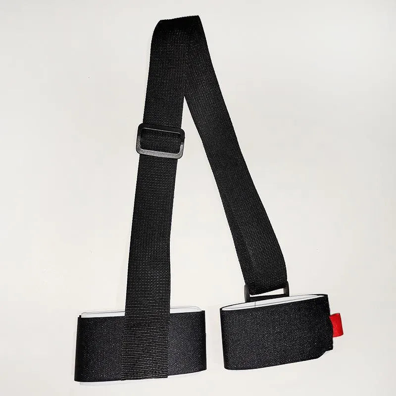 A black adjustable hook and loop shoulder strap for carrying a sled, showing the fixed sewing construction.