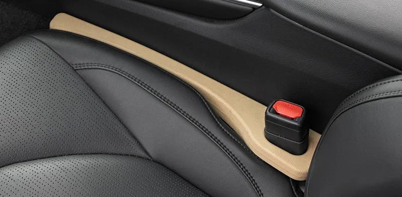 Car seat gap sealing strip made of waterproof polyresin in beige colour with handle