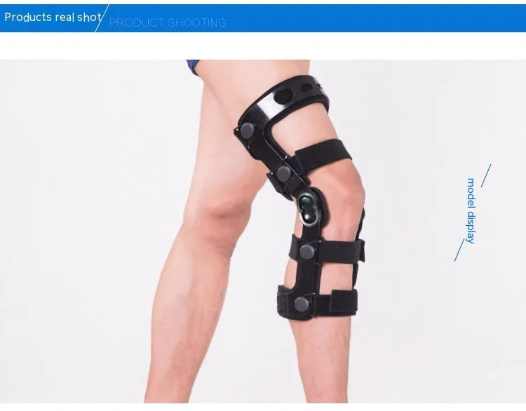 Black anterior cruciate ligament knee brace with visible metal side stays and hinges on a leg.