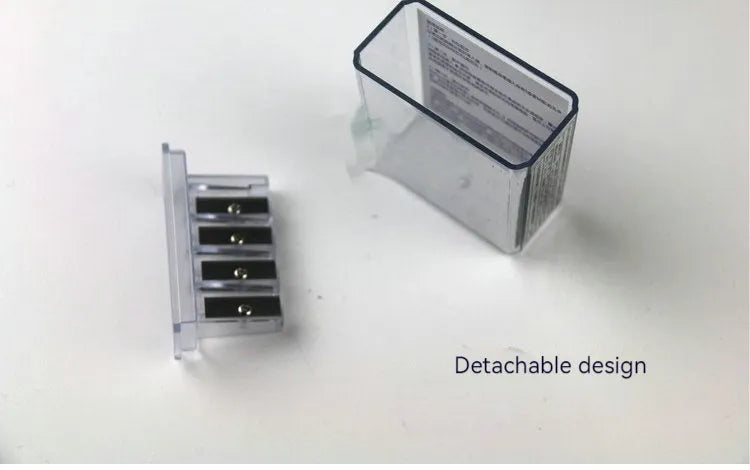 Geometric-shaped plastic pencil sharpener with four holes and an included screwdriver tool.