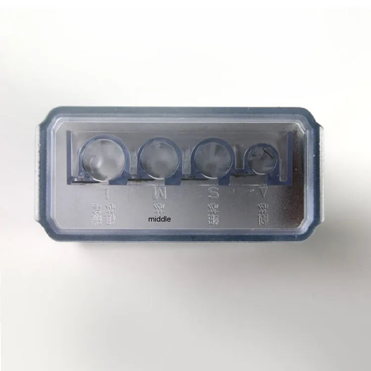 Geometric-shaped plastic pencil sharpener with four holes and an included screwdriver tool.