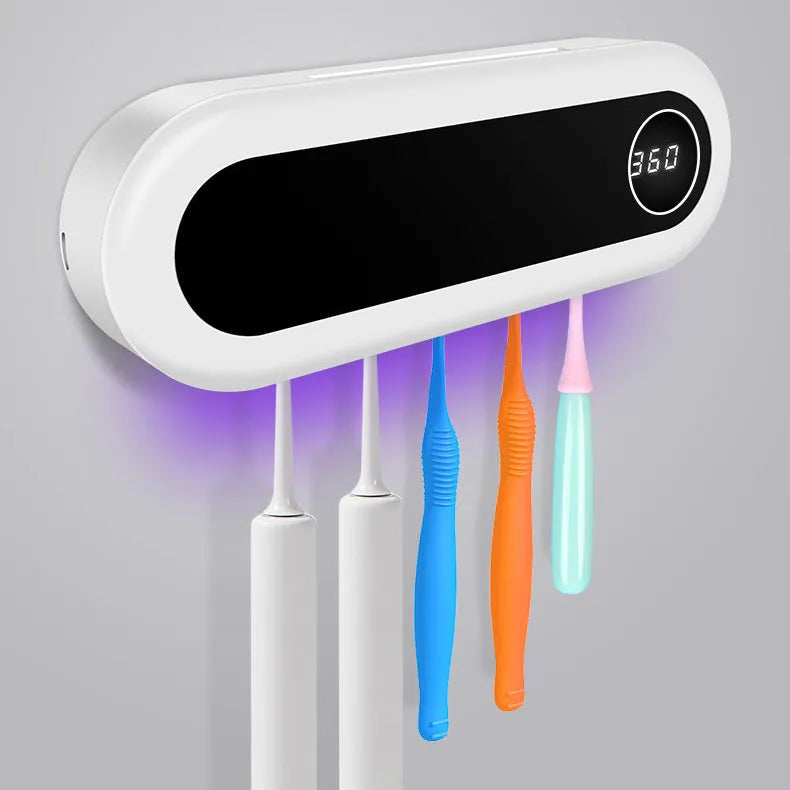 Ivory White wall mounted toothbrush holder with UV sterilizer, toothpaste dispenser squeezer, and backlit digital display