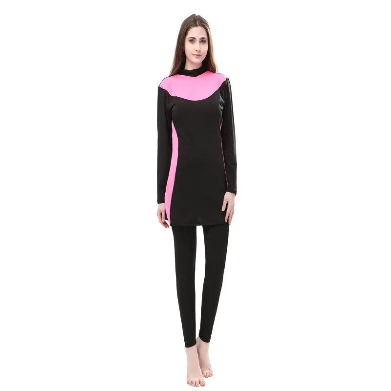 Conservative long-sleeved hooded women's swimsuit in black with coloured trim.