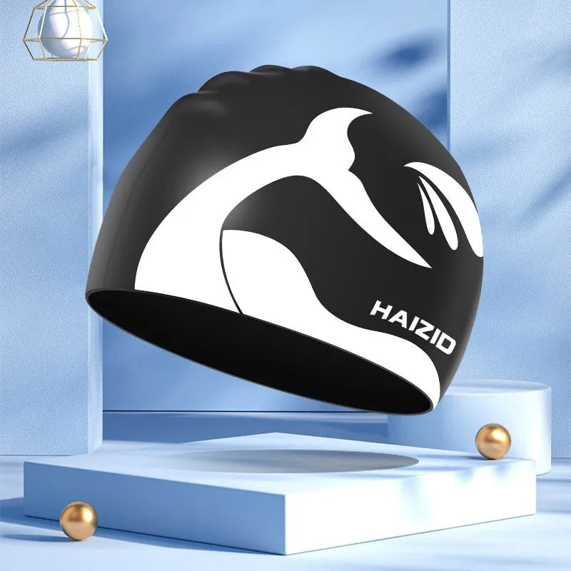 Whale tail pattern silicone swimming cap with waterproof ear protectors in multiple colour options