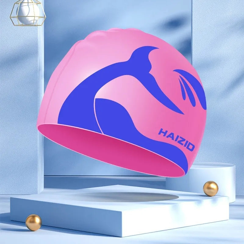 Whale tail pattern silicone swimming cap with waterproof ear protectors in multiple colour options