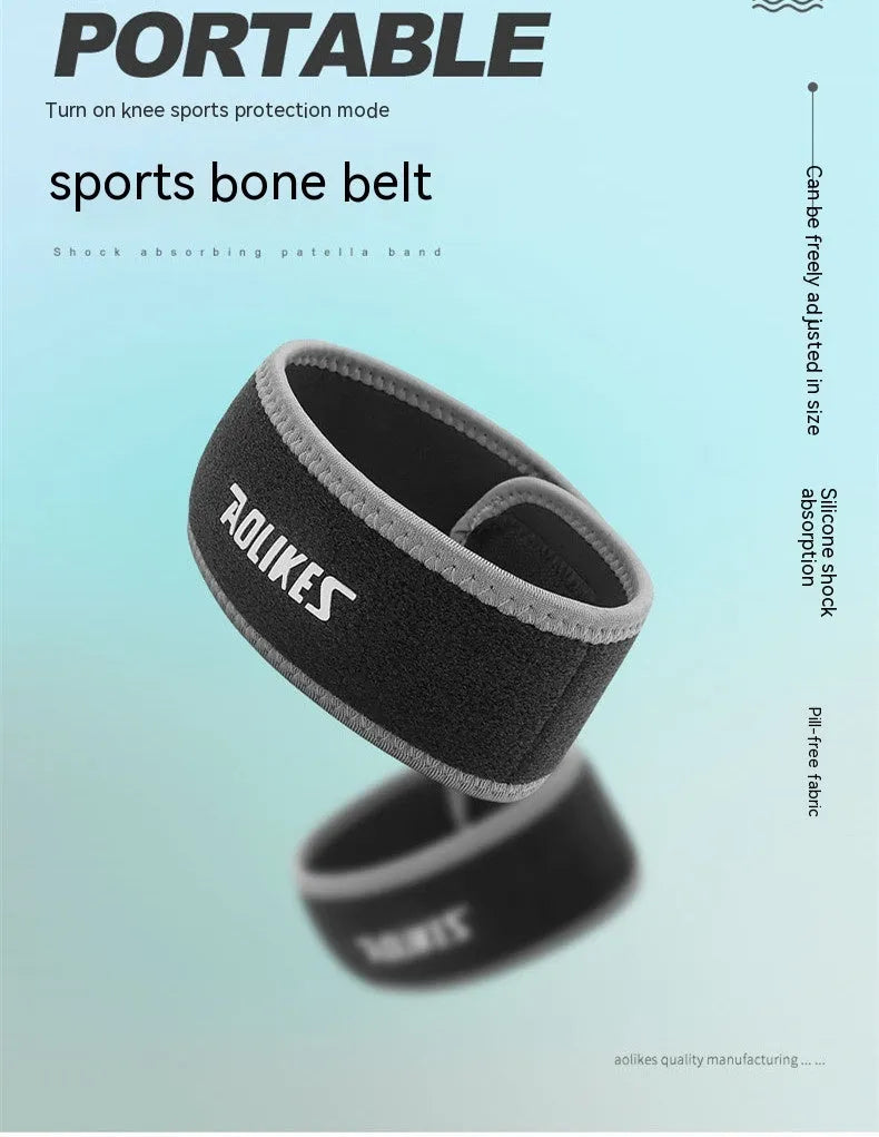 Black and grey patella retinaculum knee pad for outdoor sports protection.