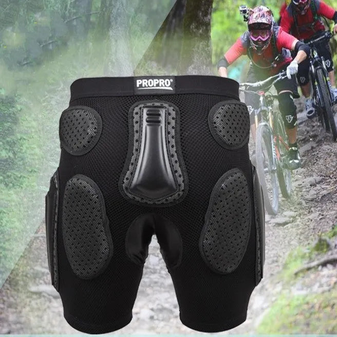 Black cycling hip protection pants showing the integrated protective pad, available in sizes S, M, L, and XL.