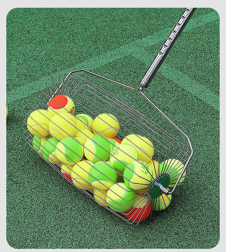 Stainless steel manual roller tennis ball picker on a court surface.