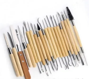 27-piece pottery clay tool set in a brown roll package for sculpting and DIY